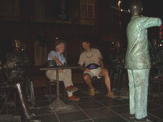 Colin Davies (left) and my good self (right) taking advantage of some humanist sculpture in Pontevedra